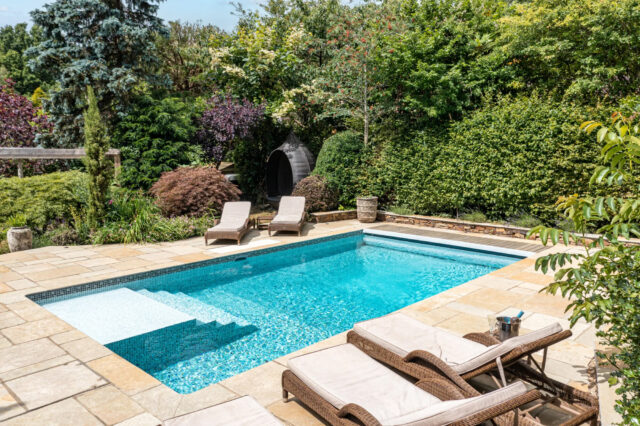 Luxury outdoor swimming pool installed by Desjoyaux Pools